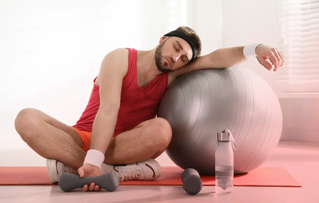 A person who has fallen asleep after a workout