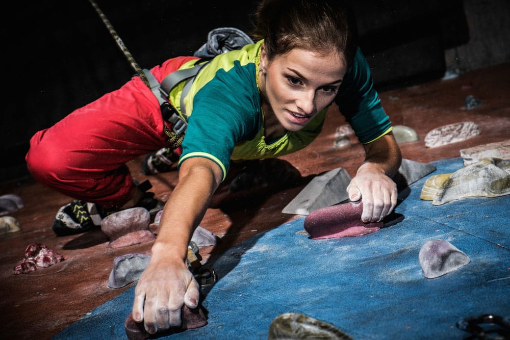 Woman rock climbing