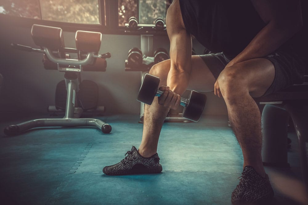 Man curling a dumbbell