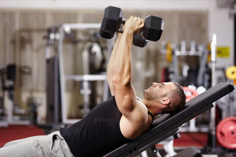 Man performing incline press