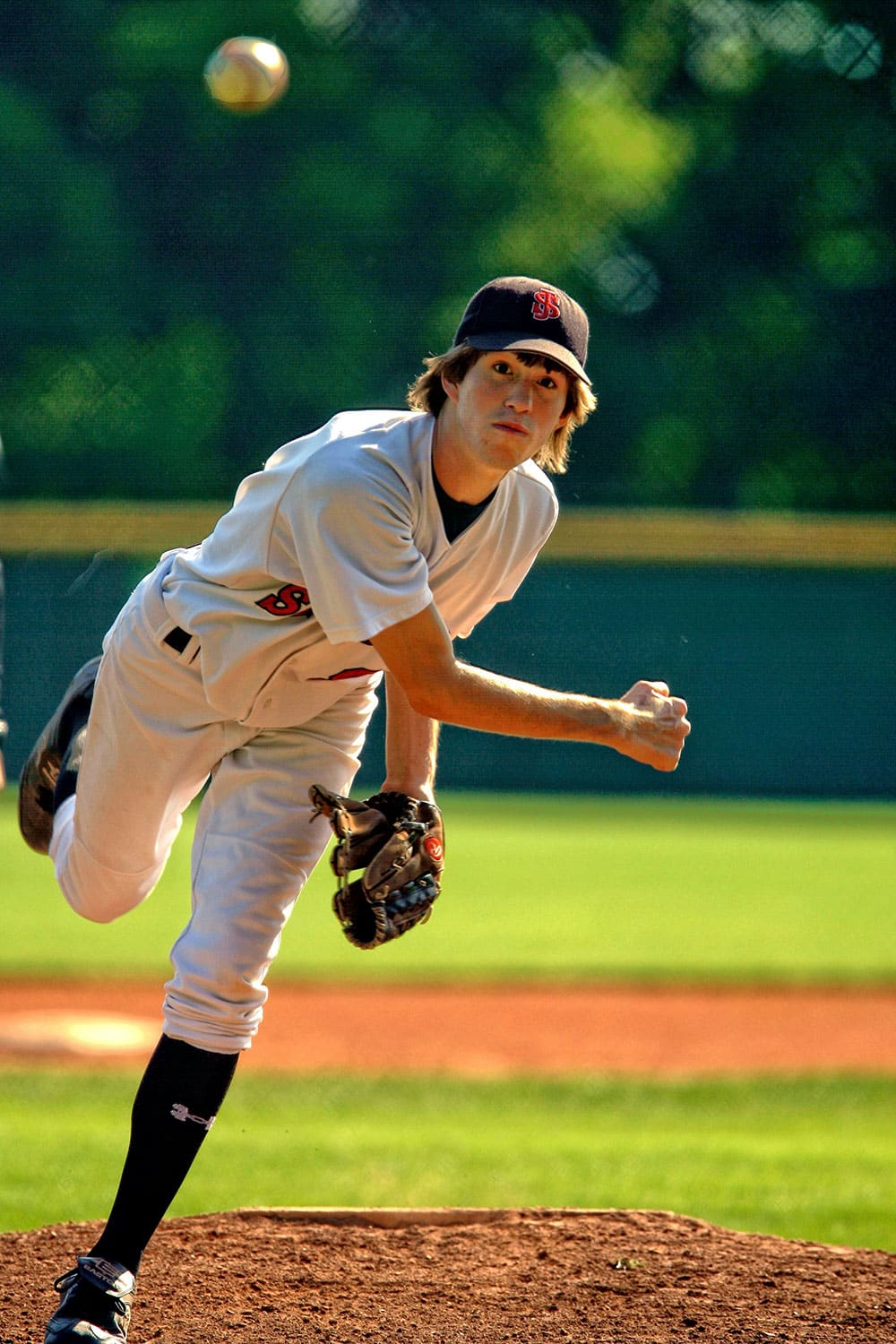 Man throwing a baseball