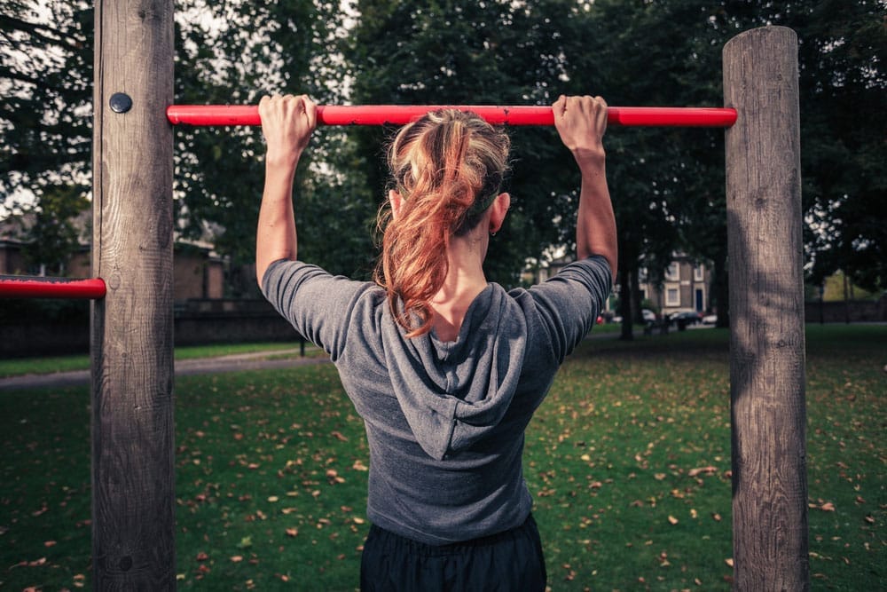 Woman doing pull-ups