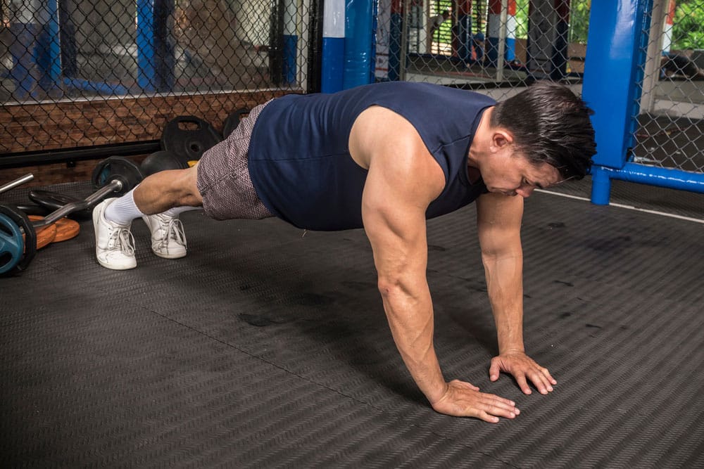 Man doing narrow push-ups