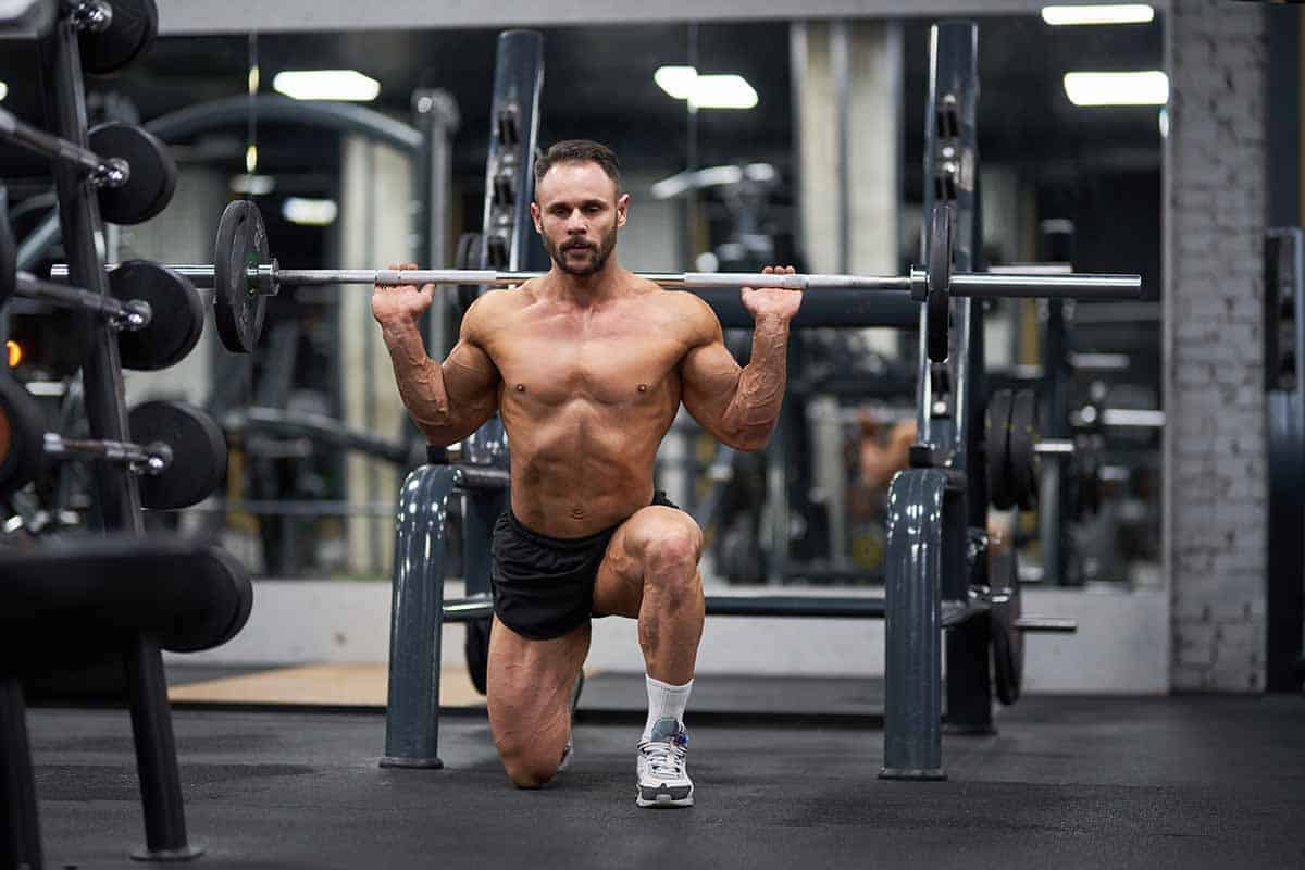 bodybuilder lifting weight at gym