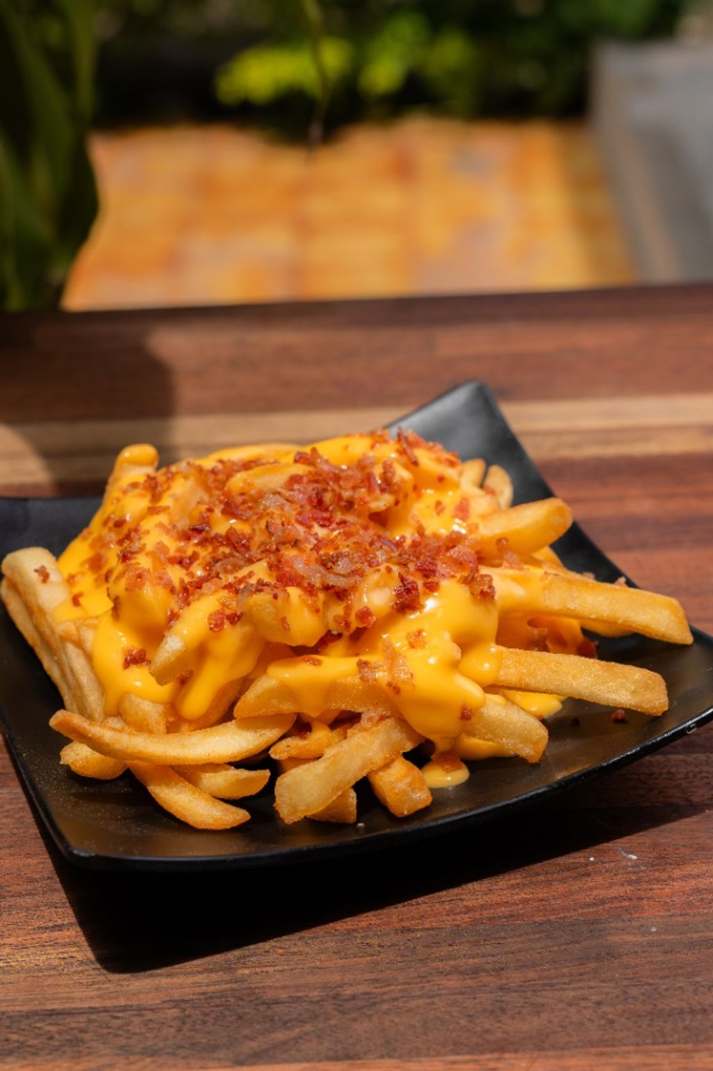 Papas con Queso y Tocino