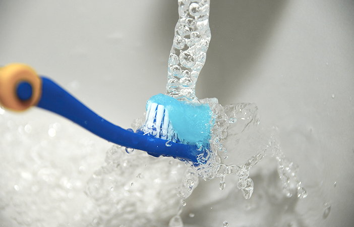 Toothbrush Under Tap