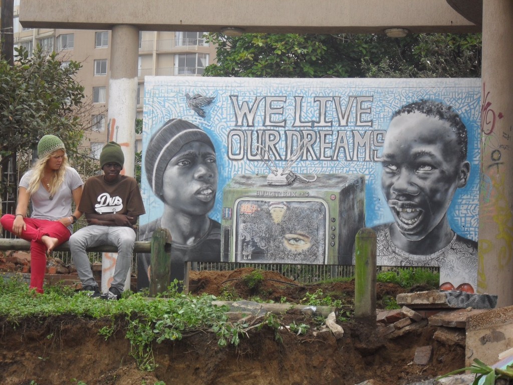 Thalente in front of his Mural