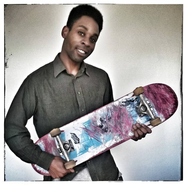 Our man Jason with his well used board.