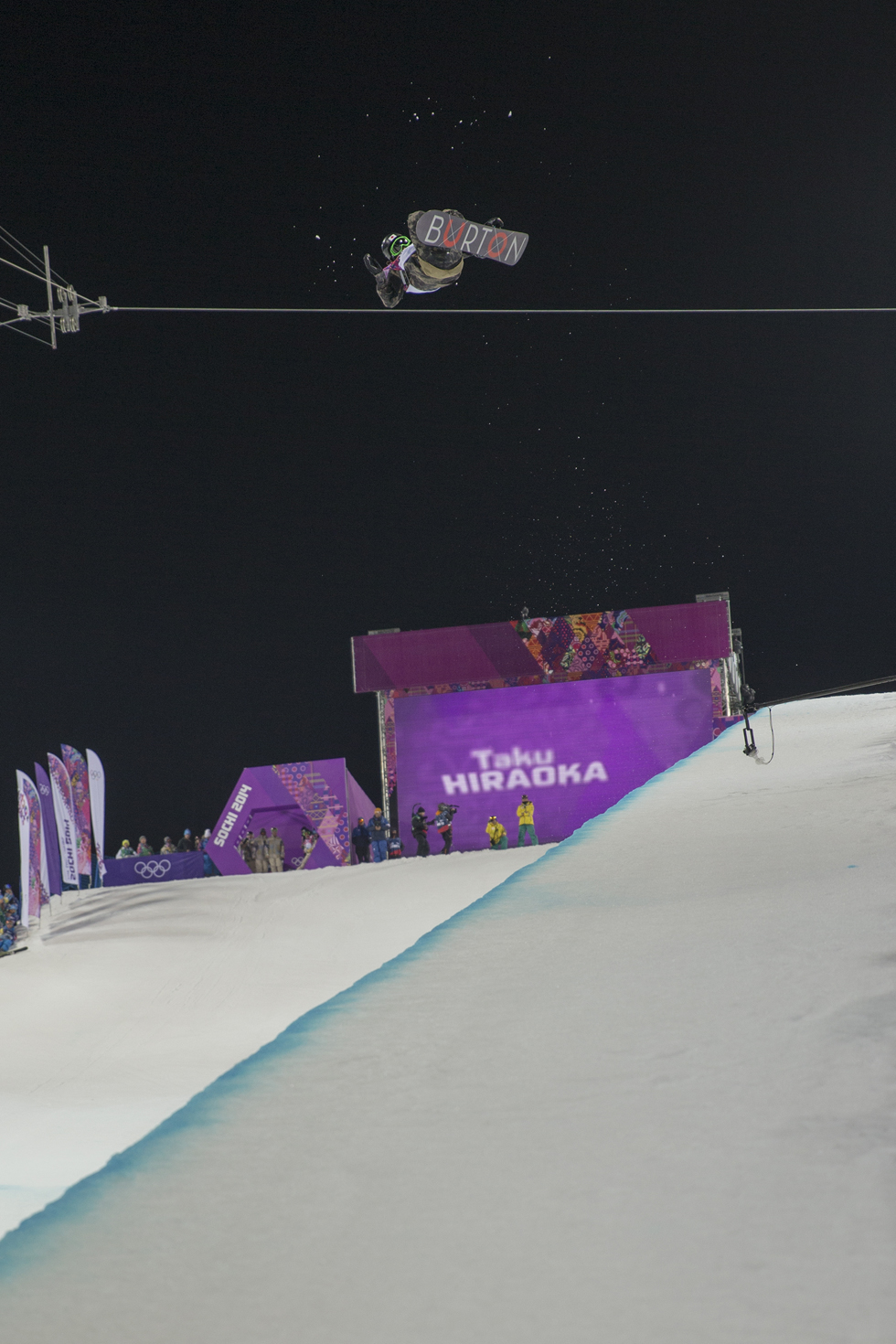 Russia Winter Olympics February 9,womans slopes style final snowboarder Jessika Jenson on the rails at top of course