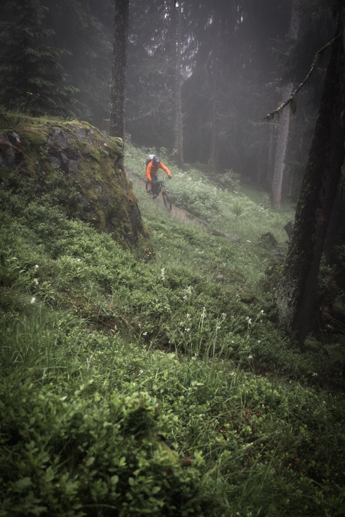 Chris Moran tackles a damp section of single track. Photo: Tristan