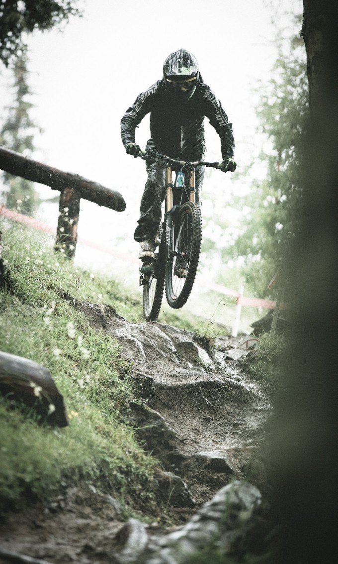 Trifon tackles a root-covered section of the bike park. Photo: Cal Jelly