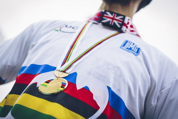 Gee Atherton puts thay medal around his neck for the second time