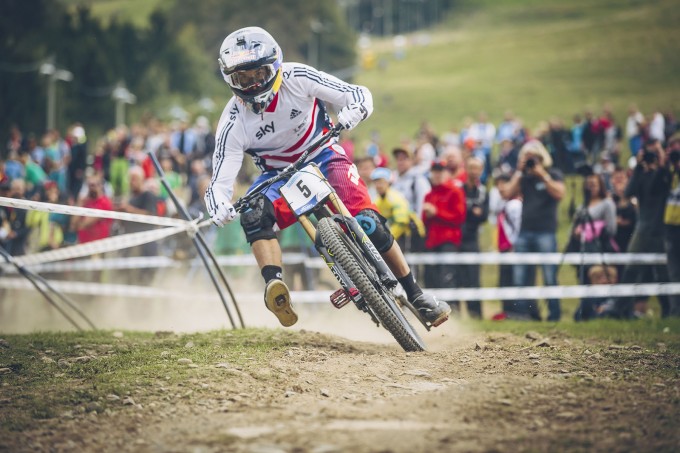 Gee Atherton once again with his signature foot out in the loose