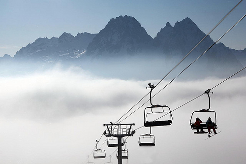 snowboarders-on-ski-lift