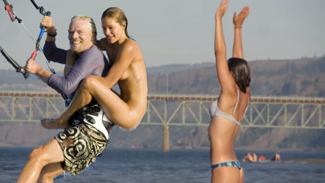 Richard Branson kiteboarding with naked model in the British Virgin Islands