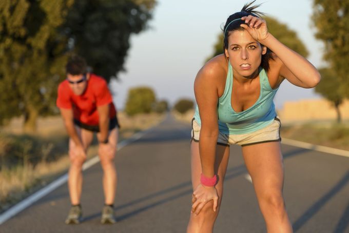 Tired athletes after running hard