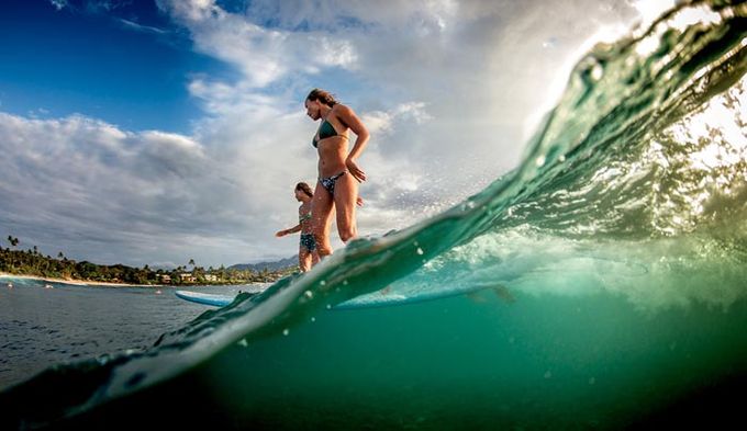 Women longboarding surfing Jim Russi