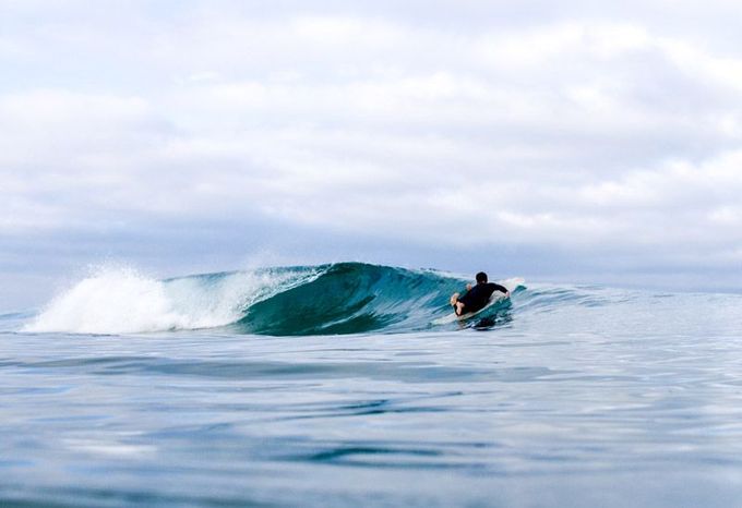 longboarding surfing robbie dark paddling