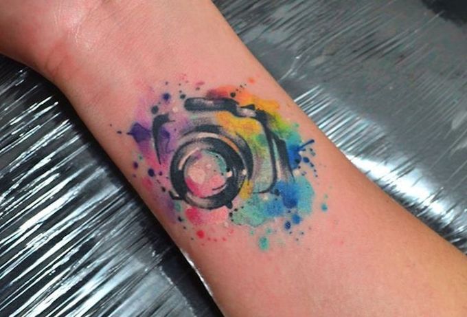 Hand in tattoos holds Photo Camera Stock Photo by ©Rawpixel 129869390