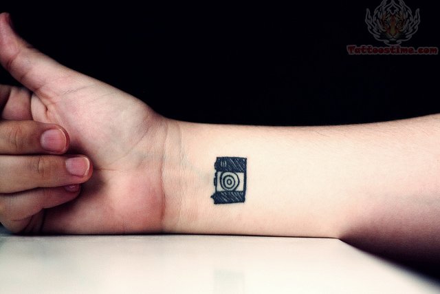 tattoo #Camera Tattoo | Small hand tattoos, Shape tattoo, Neck tattoo for  guys