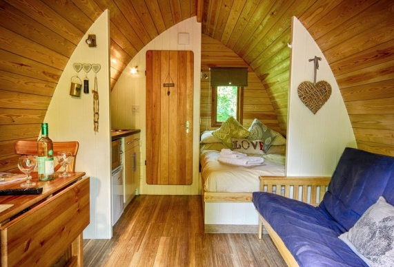 Inside a camping pod. These wooden beauties are irrresistibly cosy. Credit: Deer's Glade Luxury Camping Pods, Norfolk
