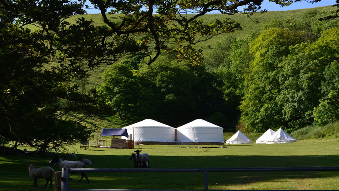 Roundhill glamping in the North Downs, Sussex, is a great place for groups and large families to go camping.