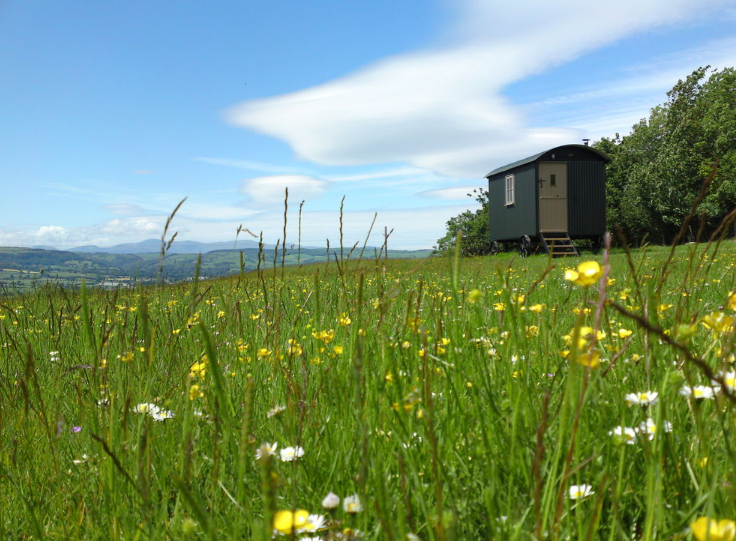 Glamping pods or Shepherd Huts are available for hire. Hikers will love how close they are to some of Wales' biggest peaks. credit: Mountain Lodge