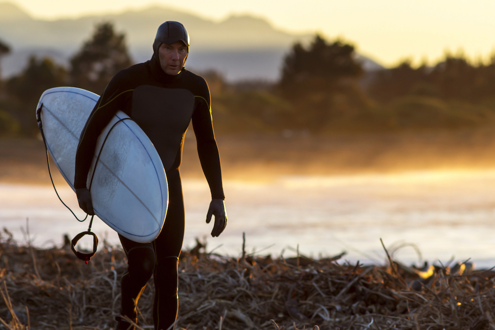 Surfing For Beginners: wetsuit boots, wetsuit gloves and a wetsuit hood - the harsh reality for many UK surfers in winter