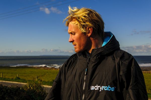 Surfing Accessories: UK big wave surfer Andrew Cotton in his dryrobe