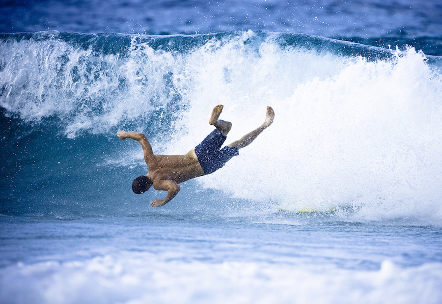 Safe Surfing Tips: surfer wipes out headfirst on Oahu's North Shore