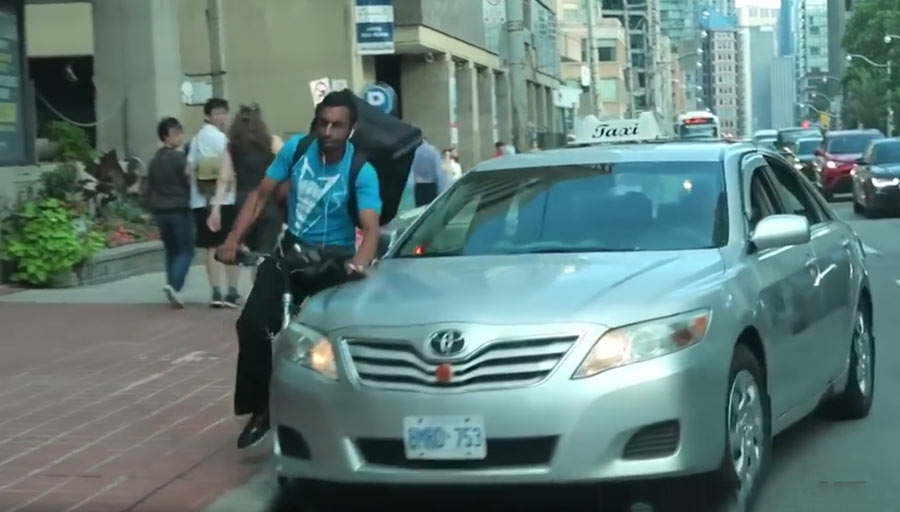 taxi-smashes-cyclist-off-bike-impact-2