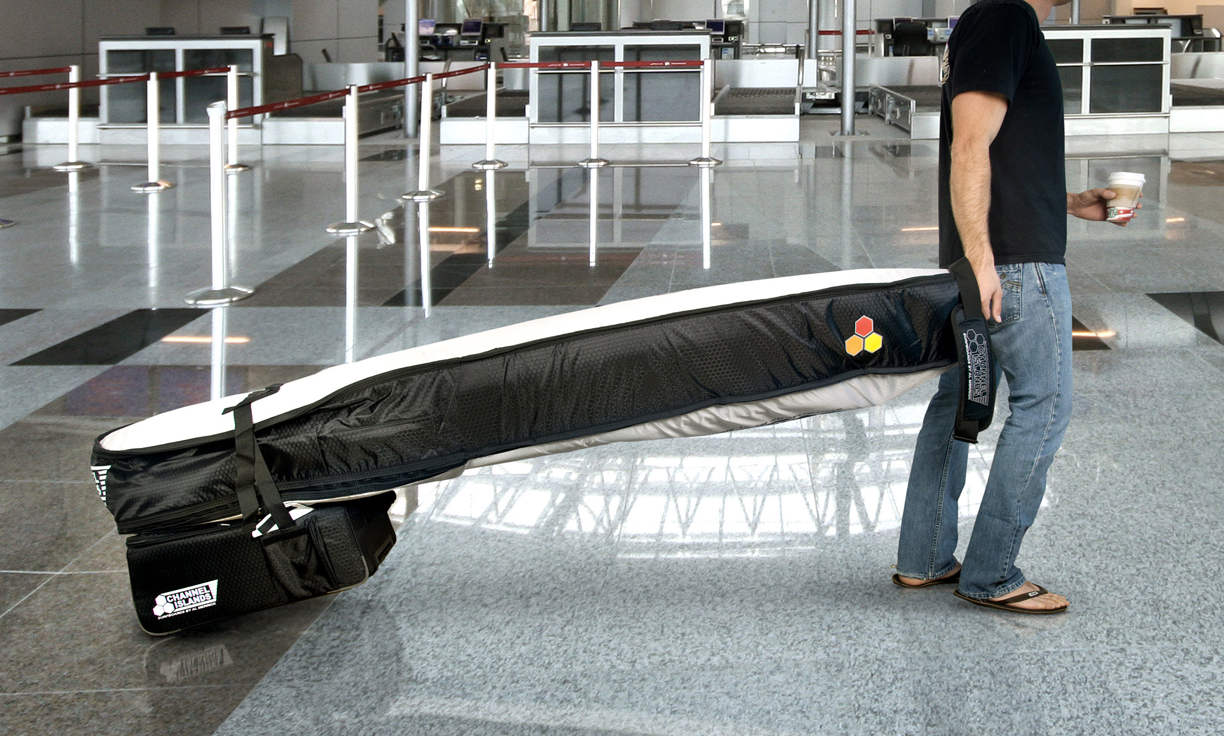Surfboard Bags: The Channel Islands Travel Light Coffin and Carry On wheelie bag