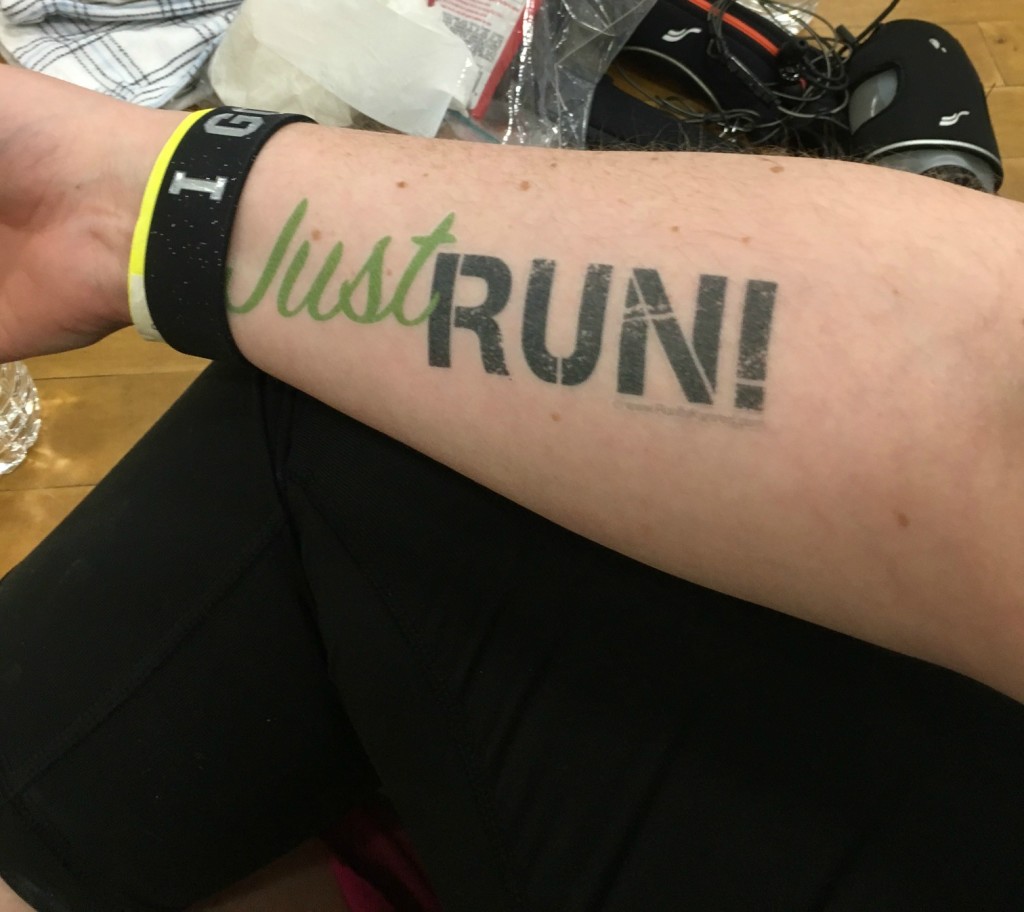 Premium Photo | Man with fullsleeve tattoos running a marathon
