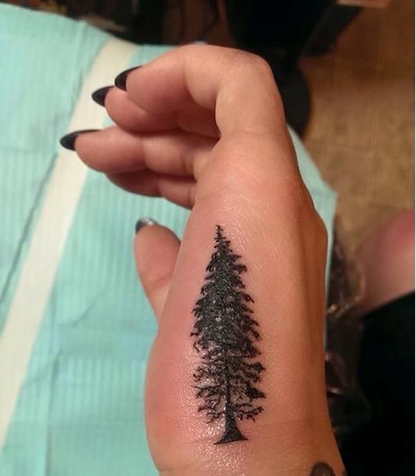 Black and white forest tattoo on arm on Craiyon