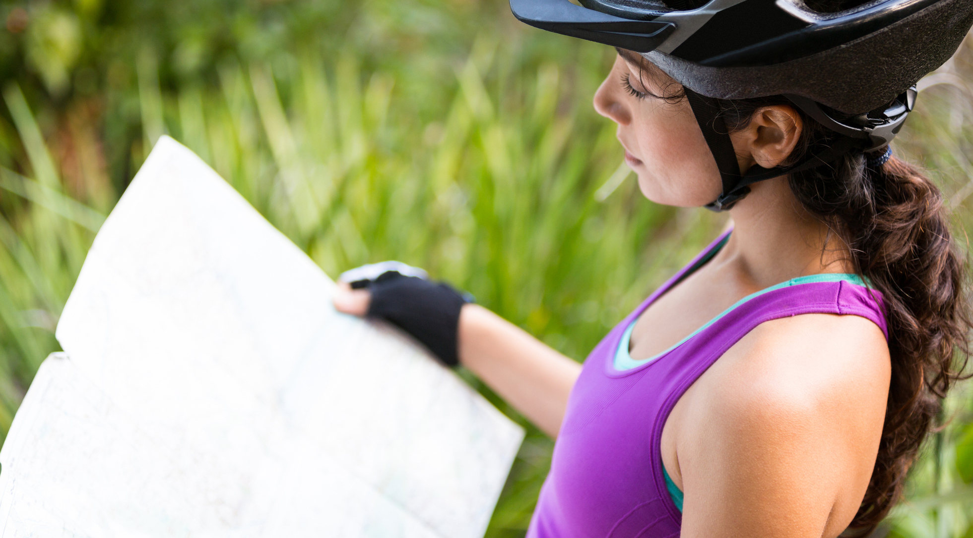 Bike Routes in the UK | 5 of the Best, Woman reading map