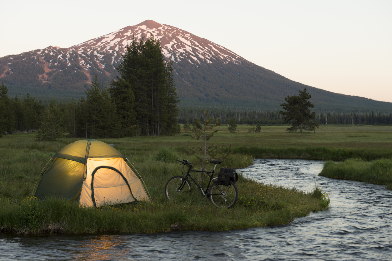 Bikepacking-vs-Cycle-Touring-What’s-the-difference-Camping-by-river