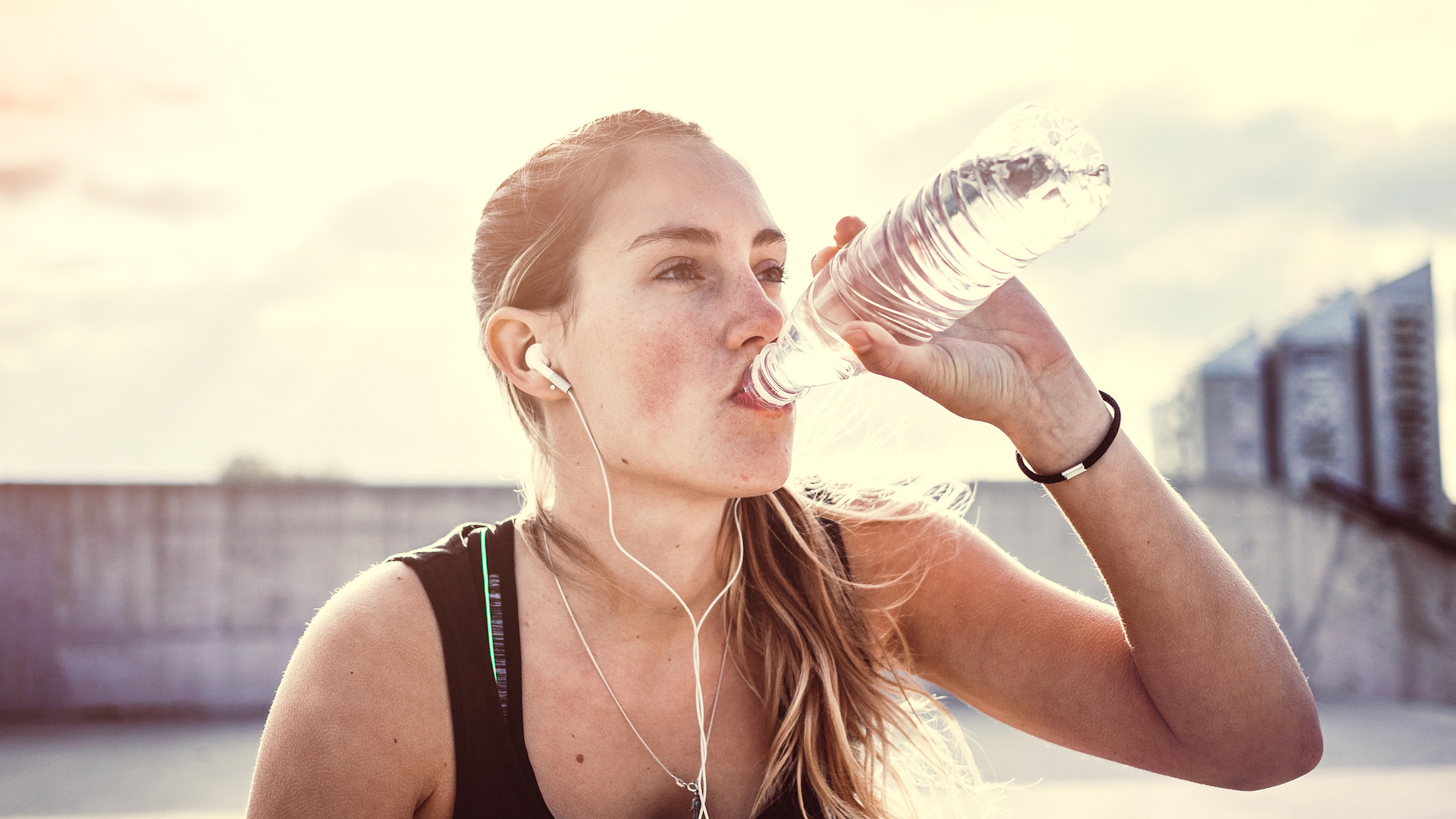 The Benefits of Running | Why You Should Start, Woman Drinking Water