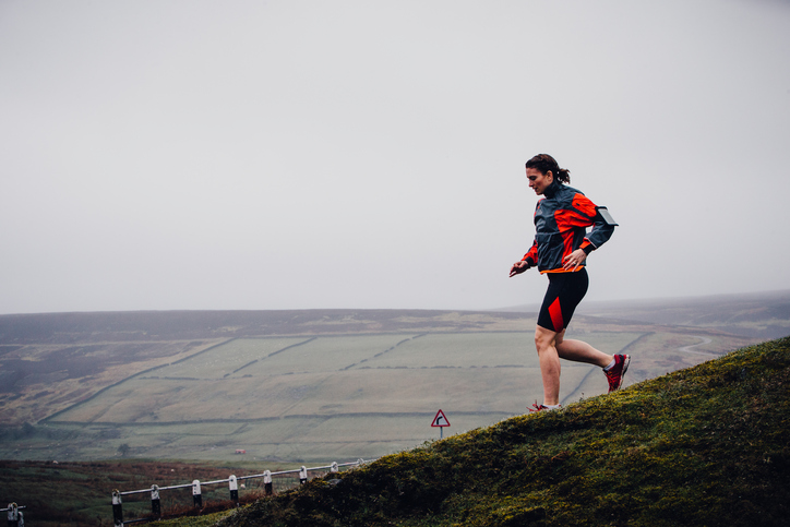 Trail Running Events in the UK | 5 of the Best, Woman trail running down