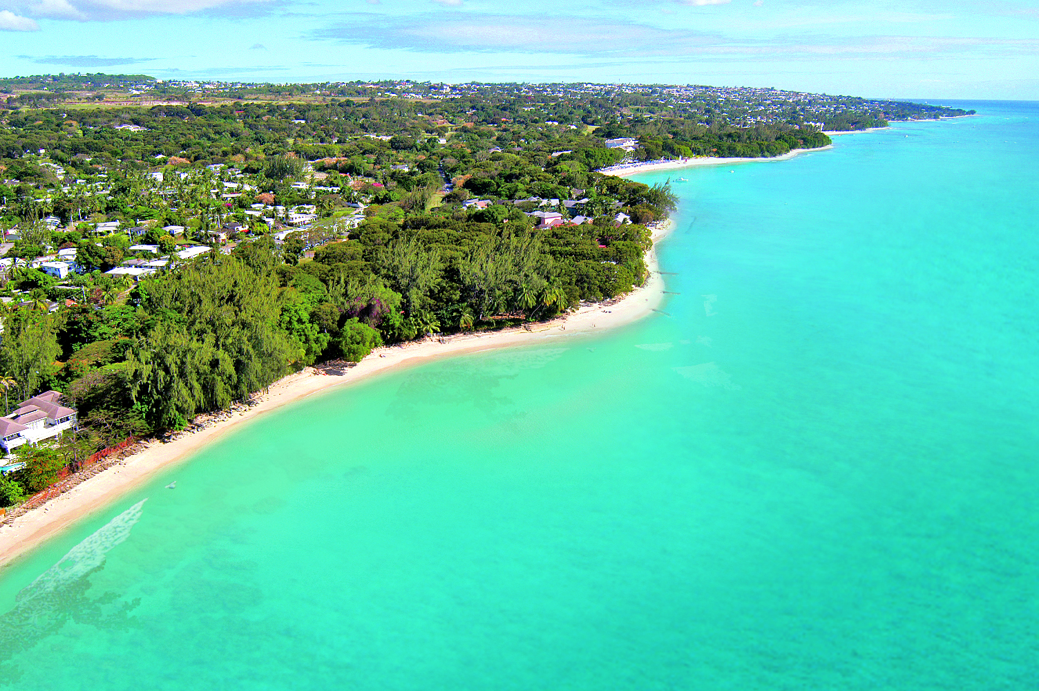 "As a surfer, there may be better quality waves at more famous destinations, but Barbados is more about that warm feeling right there." Credit: Visit Barbados