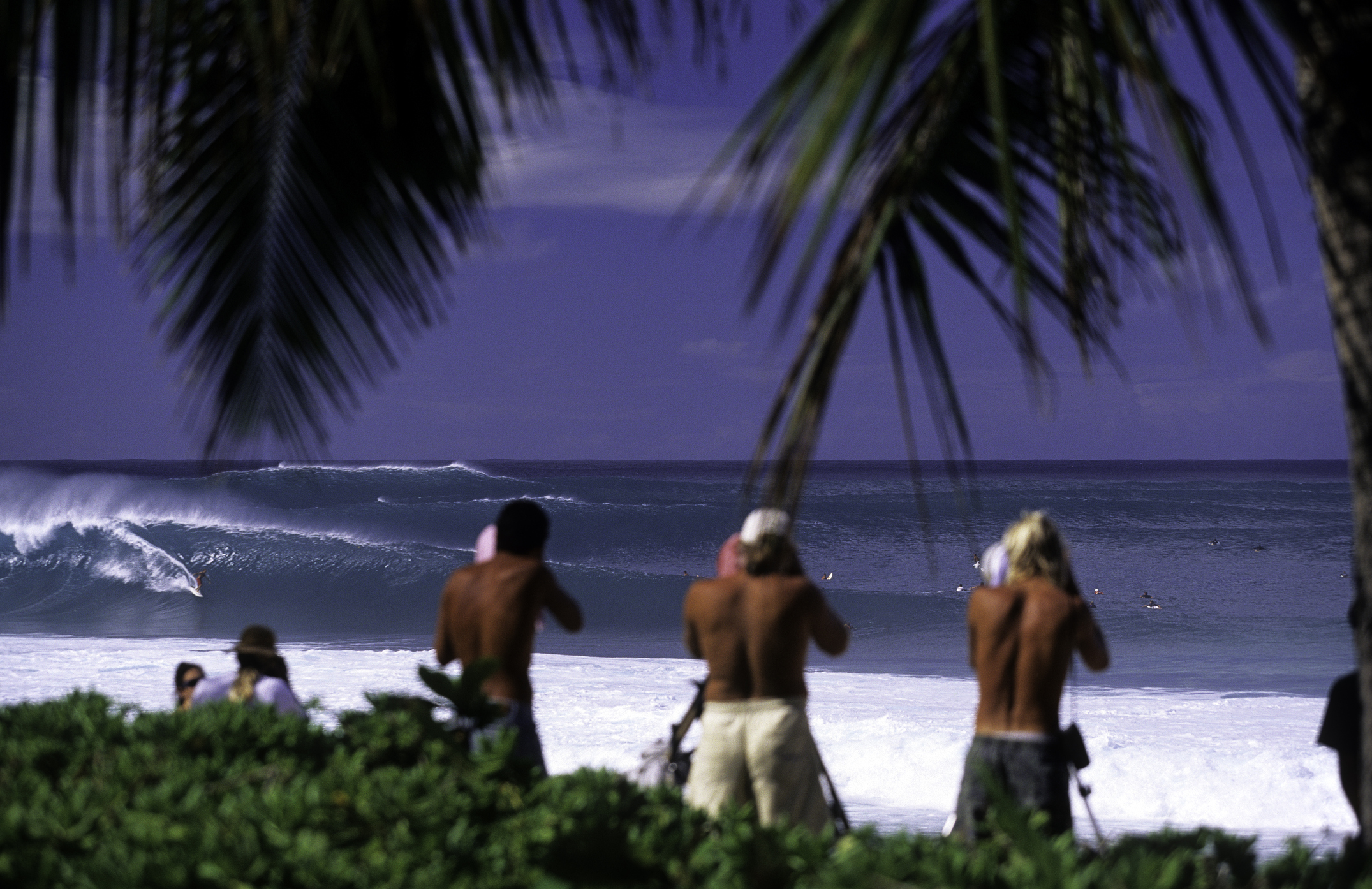 Shooting surf traditionally means lining up on the shore with a telephoto...