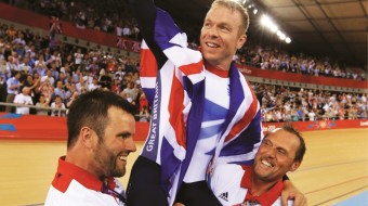 Phil Burt (left) celebrates Sir Chris Hoy's Olympic triumph (pic: British Cycling, submitted by Naomi Webb/Bloomsbury)