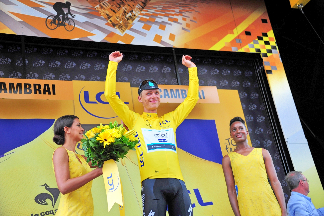 Tony Martin, Etixx-QuickStep, yellow jersey, podium, Tour de France, 2015, stage four, pic: Sirotti