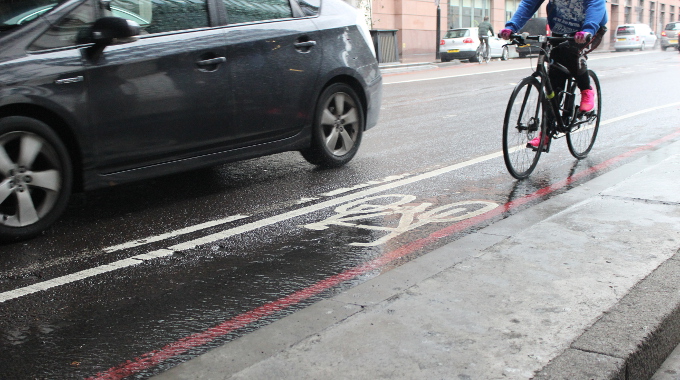 commuter rain weather wet bike lane city