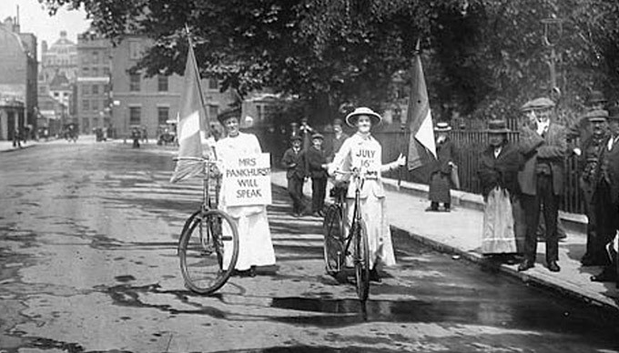 Two suffragettes on bicycles in 1914. Photograph- Corbis