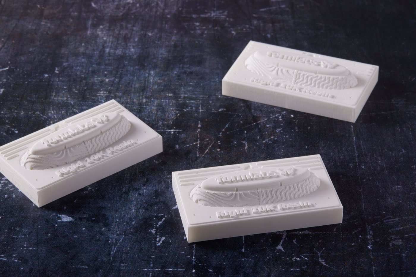 Formlabs Rigid 10K Resin sample cards showing the standard matte, off-white as-printed surface finish and texture options