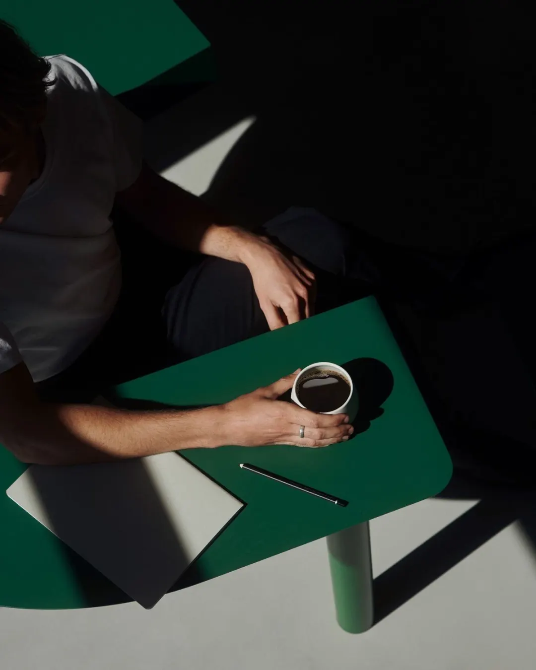 Coffee at green desk