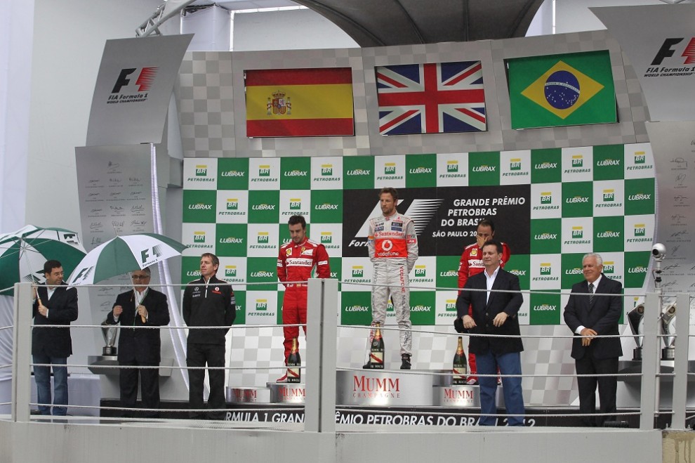 Jenson Button (GBR) race winner, 2nd position Fernando Alonso (ESP) and 3rd position Felipe Massa (BRA)