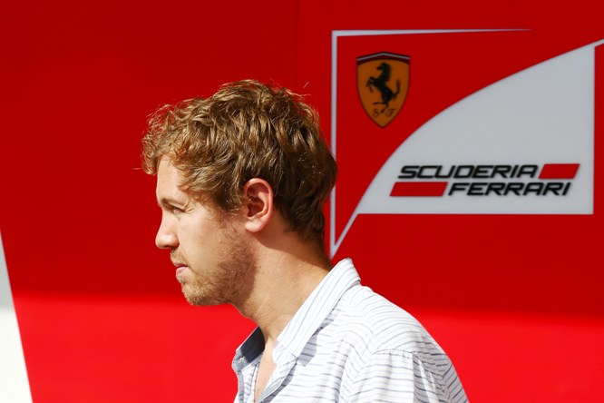 Sebastian Vettel (GER) leaves the Ferrari garage. 25.11.2014.