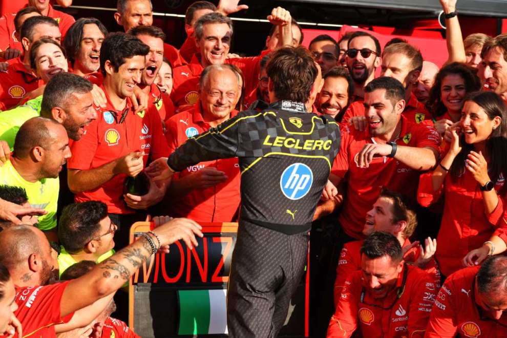 F1 GP Italia 2024, Monza: Charles Leclerc e Frederic Vasseur (Scuderia Ferrari) durante la festa per la vittoria