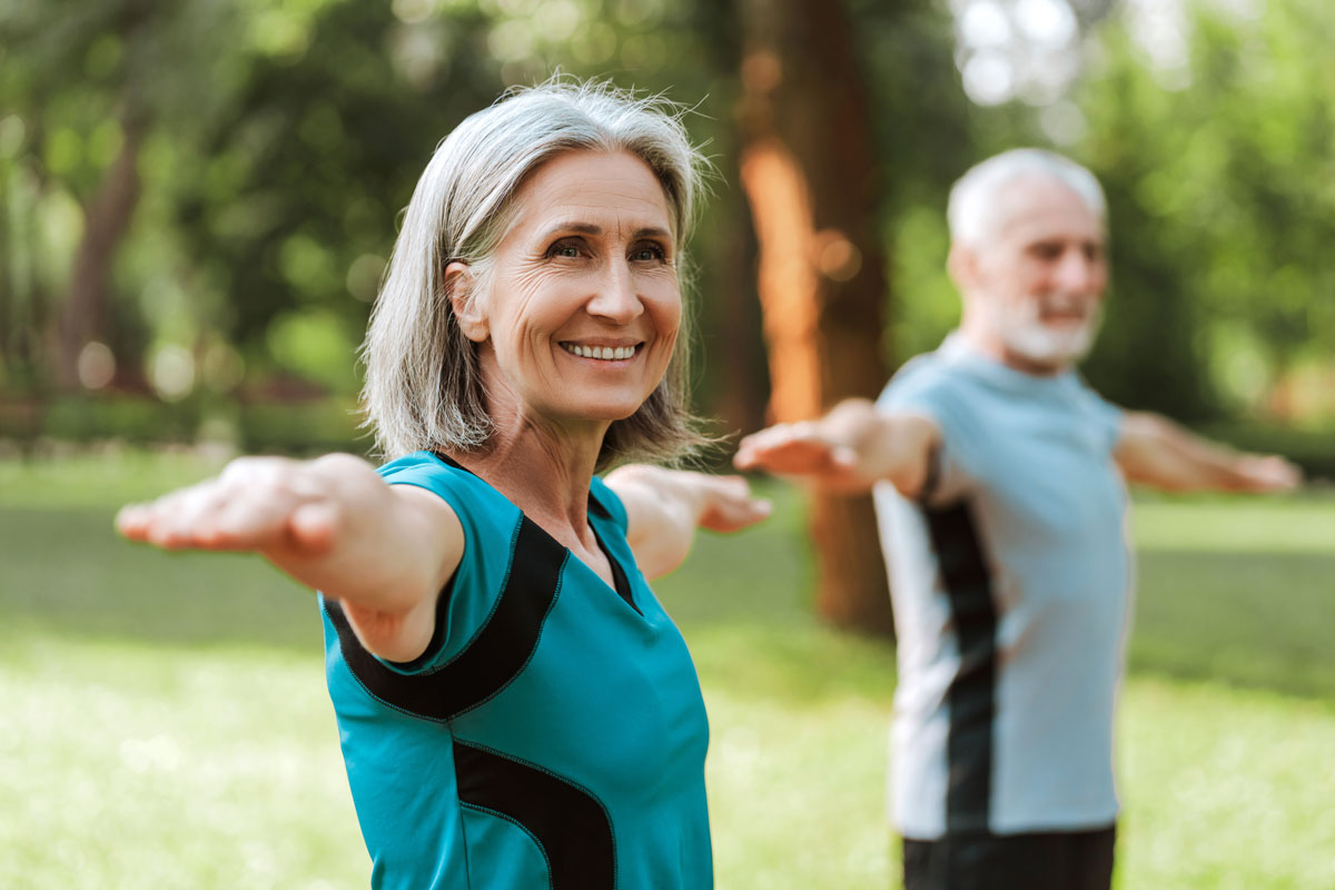 Senior couple exercising outdoors
